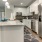 a kitchen with white cabinets