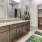 a bathroom with a marble countertop