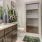 a bathroom with a tub sink and toilet